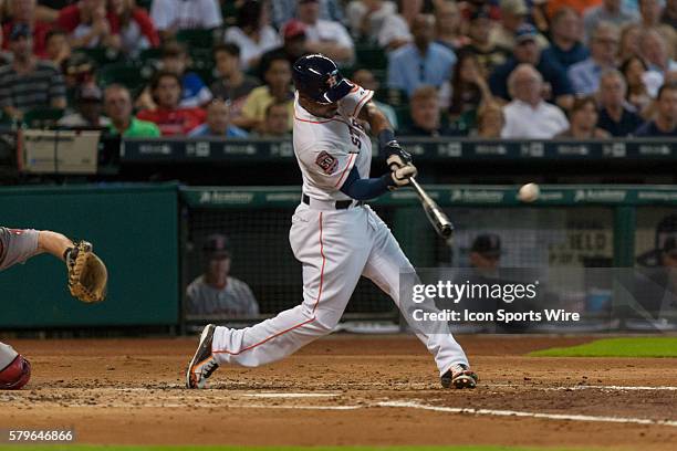 Houston Astros left fielder L.J. Hoes hitting the ball during the baseball game against the Boston Red Sox . Houston Astros defeated Boston Red Sox...