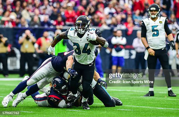 Jacksonville Jaguars Running Back Jonas Gray breaks a tackle during the Jaguars at Texans game at NRG Stadium, Houston, Texas.