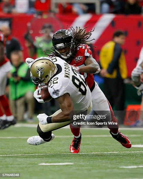 New Orleans Saints tight end Benjamin Watson is hit by Atlanta Falcons free safety Charles Godfrey in the New Orleans Saints 20-17 victory over the...