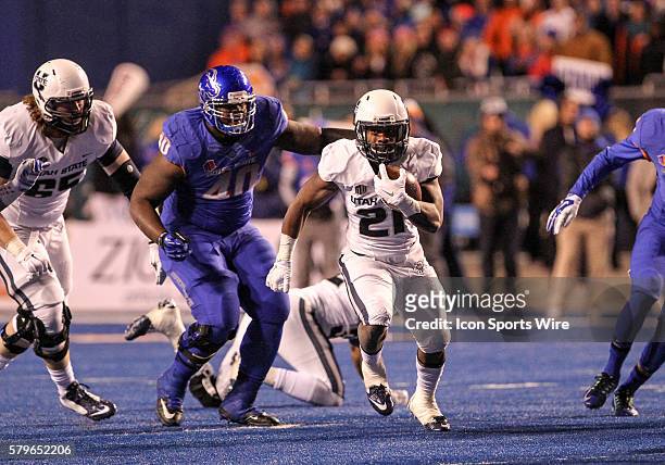 Utah State Aggies running back LaJuan Hunt running during 1st half action between the Utah State Aggies and the Boise State Broncos at Albertsons...
