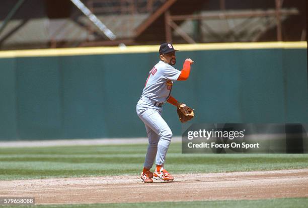 Jose Oquendo of the St. Louis Cardinals throws to first base against the San Francisco Giants during an Major League Baseball game circa 1988 at...