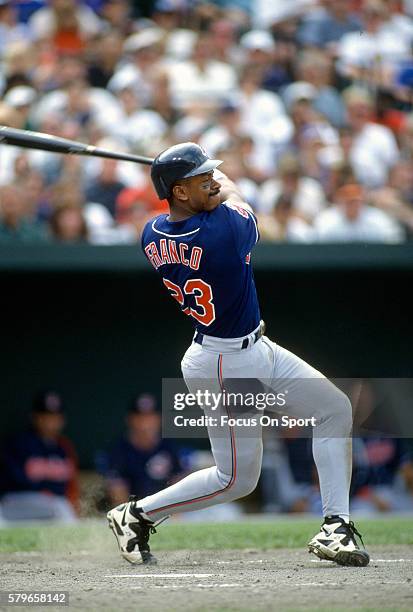 Julio Franco of the Cleveland Indians bats against the Baltimore Orioles during an Major League Baseball game circa 1996 at Oriole Park at Camden...