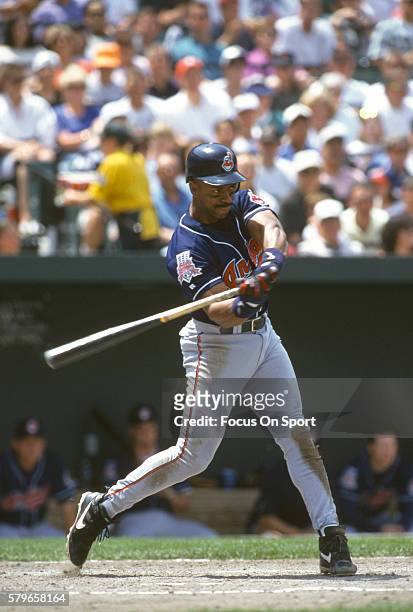 Julio Franco of the Cleveland Indians bats against the Baltimore Orioles during an Major League Baseball game circa 1996 at Oriole Park at Camden...