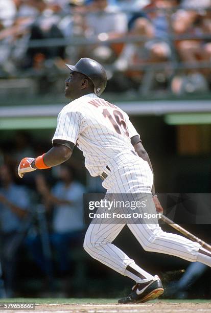 Marvell Wynne of the San Diego Padres bats during an Major League Baseball game circa 1986 at Jack Murphy Stadium in San Diego, California. Wynny...