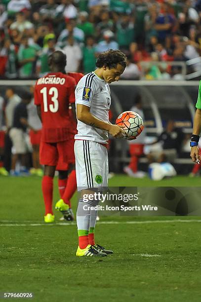 Mexico Midfielder Andres Guardado prepares to take the game winning pentaly kick in extra time during the CONCACAF semifinal match between the Panama...