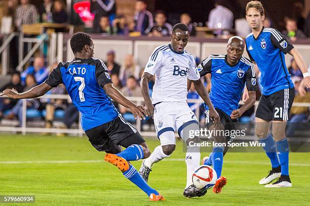 Vancouver FC forward Kekuta Manneh charges goal as San Jose Earthquakes defender Marvell Wynne , San Jose Earthquakes midfielder Cordell Cato and San...