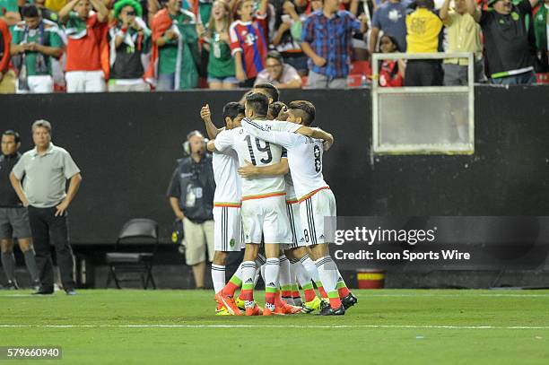 Mexico celebrates Mexico Midfielder Andres Guardado penalty kick goal in extra time during the CONCACAF semifinal match between the Panama and Mexico...