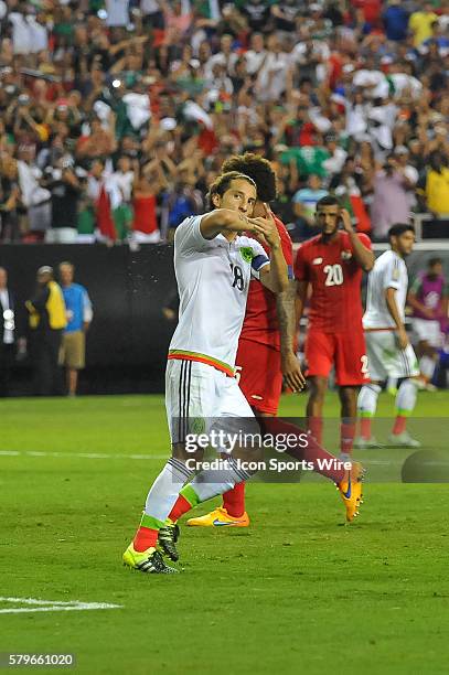 Mexico Midfielder Andres Guardado celebrates the game tying goal during the CONCACAF semifinal match between the Panama and Mexico at the Georgia...