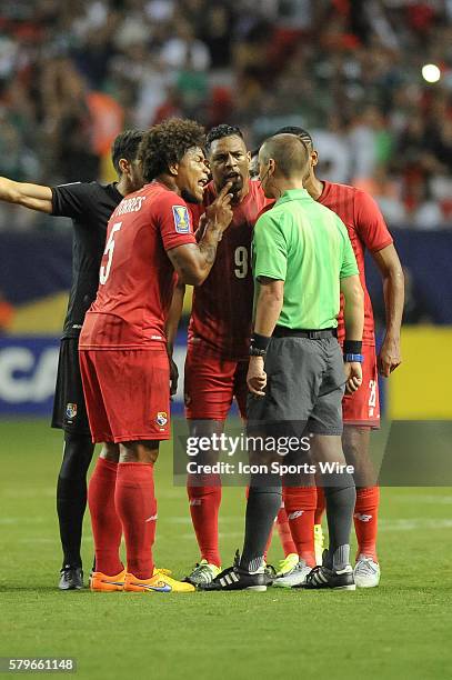 Panama Defender Roman Torres pleeds with Referee Mark Geiger after he called a red card on Panama Forward Luis Tejada during the CONCACAF semifinal...