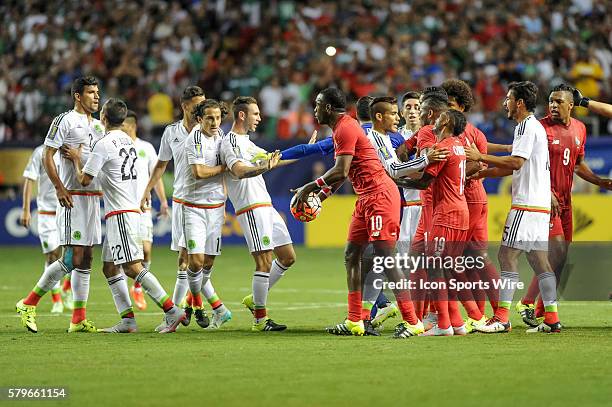 Tempers flare after Referee Mark Geiger gives Panama Forward Luis Tejada a red card during the CONCACAF semifinal match between the Panama and Mexico...