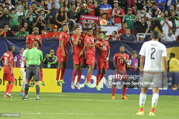 Panamanian defenders set up a perfect wall during the CONCACAF semifinal match between the Panama and Mexico at the Georgia Dome in Atlanta, GA....