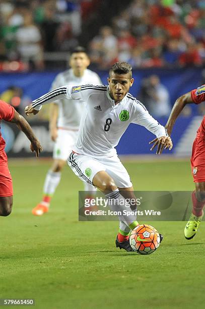 Mexico Midfielder Jonathan Dos Santos shoots on goal during the CONCACAF semifinal match between the Panama and Mexico at the Georgia Dome in...