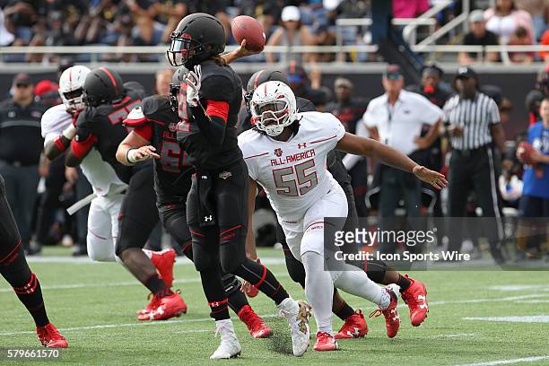 Team Heighlight defensive tackle Rashan Gary puts pressure on Team Armour quarterback Matt Fink during the 2016 Under Armour All-America Game at the...