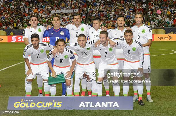 The Mexican team poses before the CONCACAF semifinal match between the Panama and Mexico at the Georgia Dome in Atlanta, GA. Mexico won 2-1 in extra...