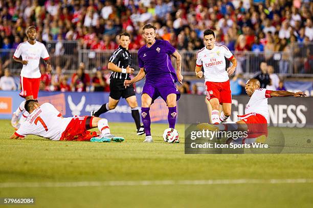 Benfica Andreas Samaris and Luis??o double team Fiorentina forward Federico Bernardeschi the first half of the International Champions Cup featuring...