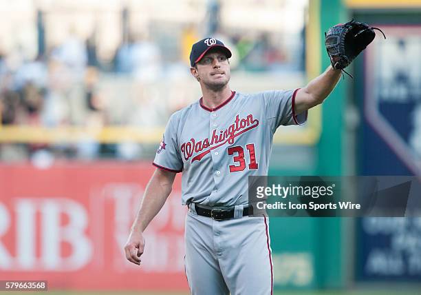 Washington Nationals starting pitcher Max Scherzer gets the ball back after giving up a two run home run to Pittsburgh Pirates first baseman Pedro...