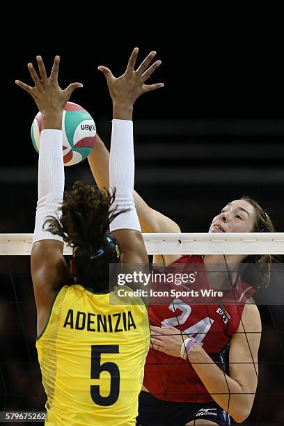 Krista Vansant of the United States hits against Adenizia Da Silva of Brazil during the Women's Volleyball gold medal match at the Toronto 2015 Pan...