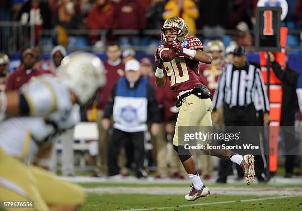 Florida State Seminoles wide receiver Rashad Greene makes a catch down the right side of the field during the ACC Championship game at Bank of...