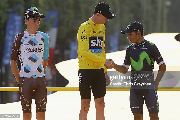 Chris Froome of Great Britain and Team Sky celebrates finishing first, Romain Bardet of France and AG2R La Mondial Team celebrates finising second...