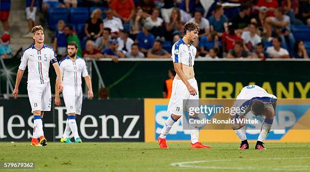 Manuel Locatelli of Italy and Andrea Favilli looks disappointed during the UEFA Under19 European Championship Final match between U19 France and U19...