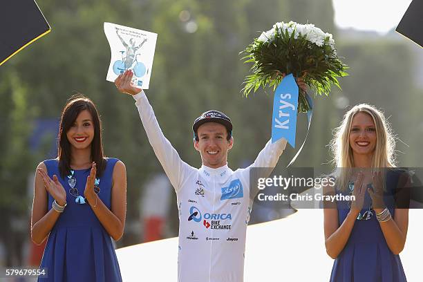 Adam Yates of Great Britain and Orica Greenedge celebrates as he is crowned the best young rider following stage twenty one of the 2016 Le Tour de...