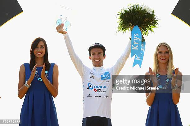 Adam Yates of Great Britain and Orica Greenedge celebrates as he is crowned the best young rider following stage twenty one of the 2016 Le Tour de...