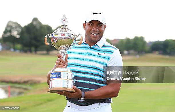 Jhonattan Vegas of Venezuela poses with the trophy after winning during the final round of the RBC Canadian Open at Glen Abbey Golf Club on July 24,...