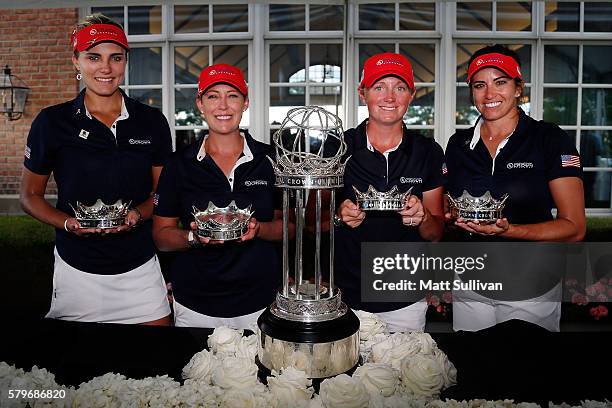 Lexi Thompson, Cristie Kerr, Stacy Lewis and Gerina Piller of the United States pose with the champions trophy after winning the 2016 UL...