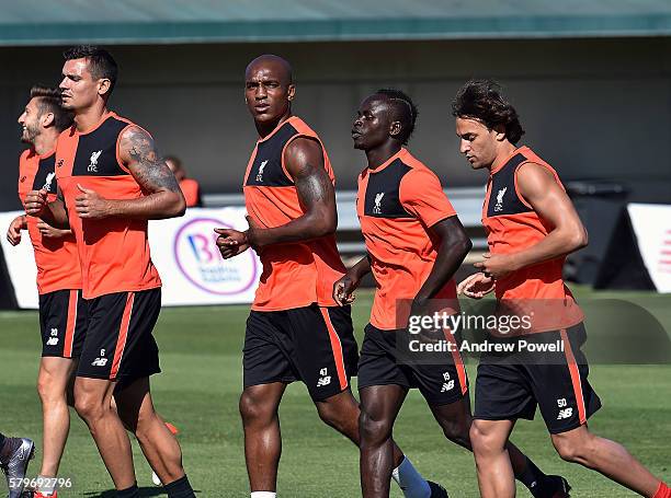 Andre Wisdom, Sadio Mane and Lazar Markovic of Liverpool during a training session at Stanford University on July 24, 2016 in Palo Alto, California.