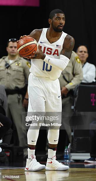 Kyrie Irving of the United States looks to pass against Argentina during a USA Basketball showcase exhibition game at T-Mobile Arena on July 22, 2016...