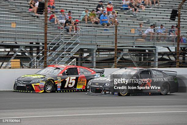 July 2015 | Martin Truex Jr. Furniture Row Chevrolet SS and Clint Boyer 5-hour Energy Toyota Camry battle for track position during the NASCAR Sprint...