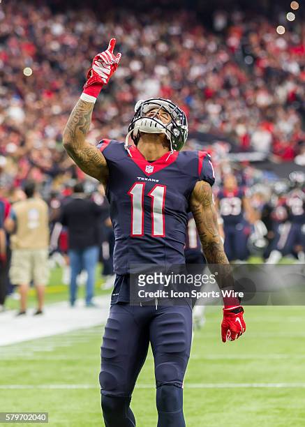 Houston Texans wide receiver Jaelen Strong makes a salute at the start of the game during the NFL Wild Card game between the Kansas City Chiefs and...