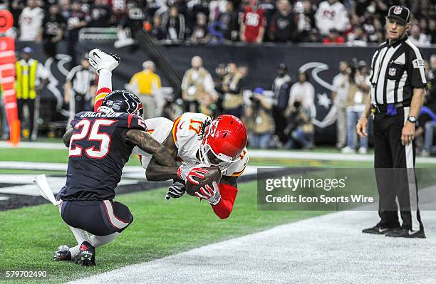 Kansas City Chiefs wide receiver Chris Conley makes a second half touchdown catch as Houston Texans defensive back Kareem Jackson defends during the...