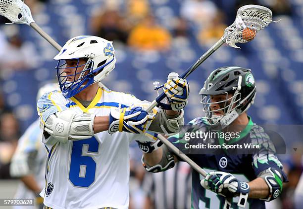 Florida Launch attacker Kieran McArdle in action against Chesapeake Bayhawks defender Michael Evans during an MLL lacrosse match between the Florida...