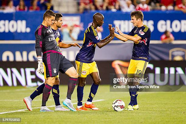 New York Red Bulls midfielder Leo Stolz congratulates Bradley Wright-Phillips after scoring during the first half of the International Champions Cup...