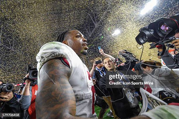 Alabama Crimson Tide running back Derrick Henry celebrates with teammates and reporters after the game in action during a game between the Alabama...