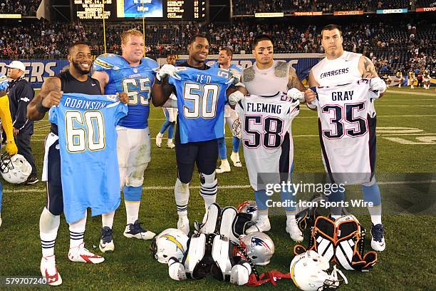 December 7, 2014; San Diego, California; USA; San Diego Chargers Center Trevor Robinson , San Diego Chargers Linebacker Manti Te'o , New England...