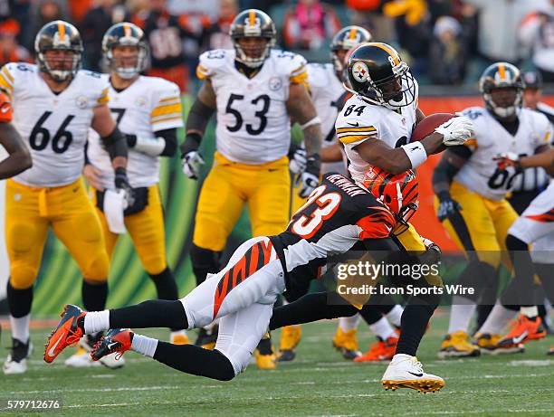 Pittsburgh Steelers wide receiver Antonio Brown against the Cincinnati Bengals' Terence Newman during the second half of play in their NFL game at...