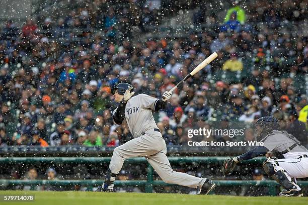 New York Yankees third baseman Chase Headley at bat during a snow squall in the first inning of a regular season game between the New York Yankees...