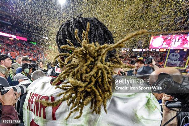 The back of Alabama Crimson Tide running back Derrick Henry head and hair is seen as he celebrates in action during a game between the Alabama...