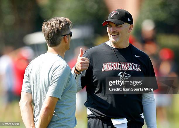 Atlanta Falcons head coach Dan Quinn gives the thumbs up to General Manager Thomas Dimitroff during the Atlanta Falcons Training Camp at Falcons...