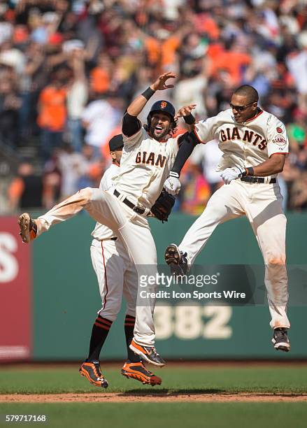 San Francisco Giants center fielder Angel Pagan and San Francisco Giants right fielder Justin Maxwell celebrate their win, after a Major League...