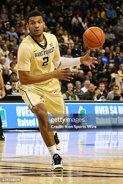 Wake Forest Demon Deacons forward Devin Thomas passes off during the regular season matchup between Wake Forest and Duke at Lawrence-Joel Memorial...