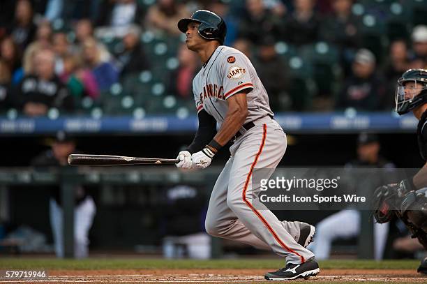 San Francisco Giants right fielder Justin Maxwell hits a second inning homerun during a regular season Major League Baseball game between the San...