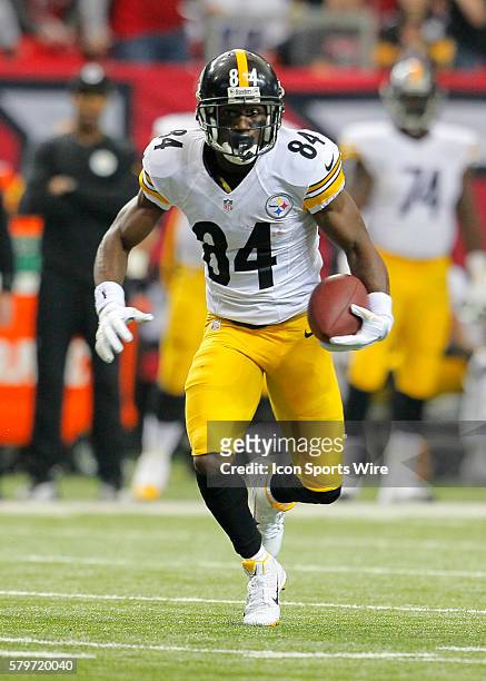 Pittsburgh Steelers wide receiver Antonio Brown looks for extra yardage in the Pittsburgh Steelers 27-20 victory over the Atlanta Falcons at the...