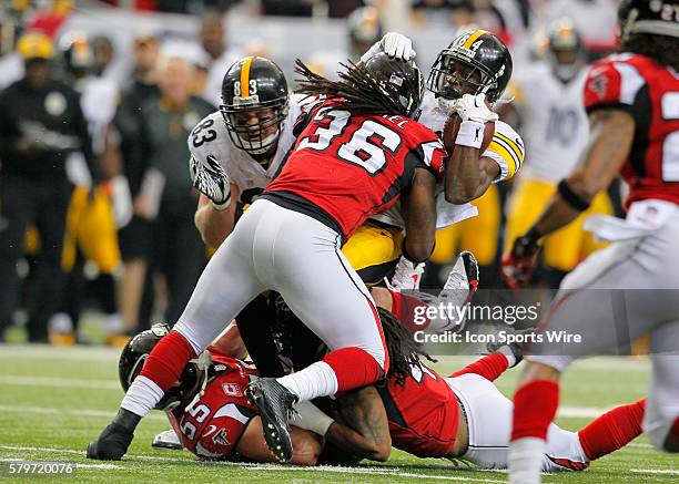 Pittsburgh Steelers wide receiver Antonio Brown is hit hard by Atlanta Falcons strong safety Kemal Ishmael in the Pittsburgh Steelers 27-20 victory...