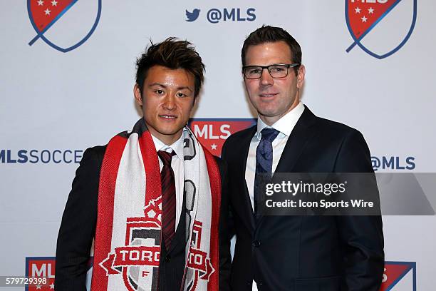 Tsubasa Endoh left, with head coach Greg Vanney , was selected with the overall pick by Toronto FC. The 2016 MLS SuperDraft was held at The Baltimore...