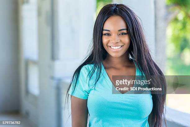portrait of beautiful african american young woman - beautiful college girls stock pictures, royalty-free photos & images