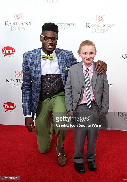 Basketball player Nerlens Noel of the Philadelphia 76ers, and formerly of the University of Kentucky, arrives on the red carpet with his friend Kelly...