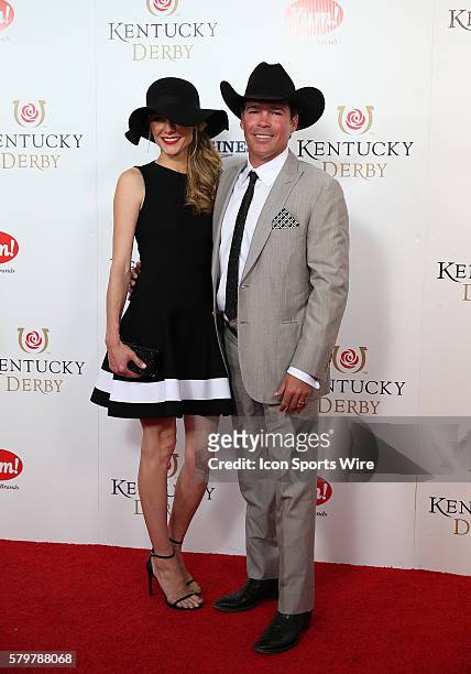 Musician Clay Walker and his wife, Jessica, arrive on the red carpet at the 141st running of the Kentucky Derby at Churchill Downs in Louisville, KY.